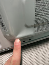 Mainstays 0.7 Cu ft Countertop Microwave Oven, 700 Watts, White**New, minor dent from shipping**