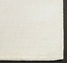 SAFAVIEH Mirage Caelestinus Solid Area Rug, White, 10' x 14'- NEW IN PLASTIC!!!