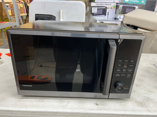 Toshiba 1.0 Cu. ft 8-in-1 Air Fryer Microwave Oven Combo, 1000 Watts, Black Stainless Steel!! NEW OUT OF BOX(DENTED FROM SHIPPING)!!