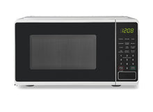 Mainstays 0.7 Cu ft Countertop Microwave Oven, 700 Watts, White**New, minor dent from shipping**