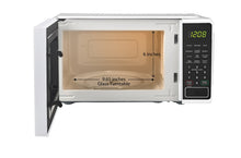 Mainstays 0.7 Cu ft Countertop Microwave Oven, 700 Watts, White**New, minor dent from shipping**