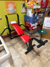 Used weight bench and short bar