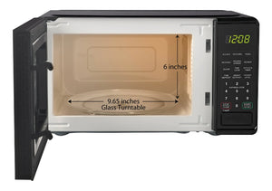 Mainstays 0.7 Cu ft Compact Countertop Microwave Oven, Black- new out of box, minor dent from shipping tested works great!