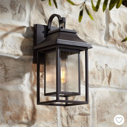 From the Cecile collection by John Timberland®, this outdoor wall light offers a modern update of classic lantern styles. It comes in a painted bronze finish - new in box