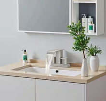 Androme 4 in. Centerset Double Handle Low Arc Bathroom Faucet with Pop-up Drain Included in Brushed Nickel!! NEW IN BOX!!