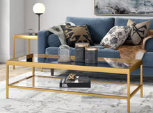 Alexis 54 in. Brass Rectangle Glass Top Coffee Table! (NEW IN BOX)