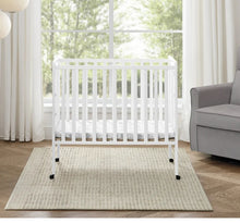 Delta Children Lee Portable Folding Mini Crib with 1.5-Inch Mattress - Greenguard Gold Certified, Bianca White- new