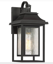 From the Cecile collection by John Timberland®, this outdoor wall light offers a modern update of classic lantern styles. It comes in a painted bronze finish - new in box
