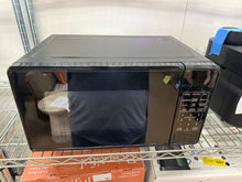 Mainstays 0.7 Cu ft Countertop Microwave Oven, 700 Watts, Black!! LIGHTLY USED, MINOR SCRATCH & DENT- WE DO NOT SHIP!!