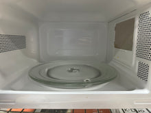 Mainstays 0.7 Cu ft Countertop Microwave Oven, 700 Watts, Black!! LIGHTLY USED, MINOR SCRATCH & DENT- WE DO NOT SHIP!!