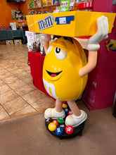 M&M Yellow Character Candy Store Display w/ Storage Tray 

Rolling Wheels

(47” tall) 

used condition