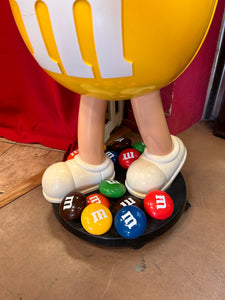 M&M Yellow Character Candy Store Display w/ Storage Tray 

Rolling Wheels

(47” tall) 

used condition