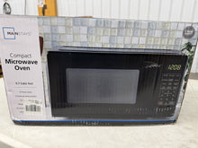 Mainstays 0.7 Cu ft Countertop Microwave Oven, 700 Watts, Black!! NEW IN BOX!!