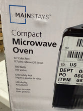 Mainstays 0.7 Cu ft Countertop Microwave Oven, 700 Watts, Black!! NEW IN BOX!!