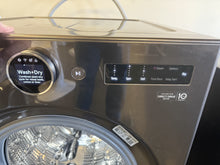 LG TurboWash360 5-cu ft Capacity Black Steel Ventless All-in-One Washer/Dryer Combo with Steam Cycle ENERGY STAR!! USED ONCE, LIKE NEW(VERY CLEAN, MINOR DENT ON BACK FROM SHIPPING)!!