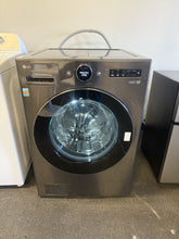 LG TurboWash360 5-cu ft Capacity Black Steel Ventless All-in-One Washer/Dryer Combo with Steam Cycle ENERGY STAR!! USED ONCE, LIKE NEW(VERY CLEAN, MINOR DENT ON BACK FROM SHIPPING)!!