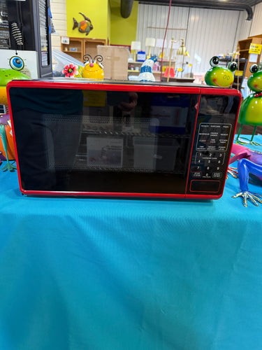 Mainstays 0.7 cu. ft. Countertop Microwave Oven, 700 Watts, Red! (USED - DENTED)