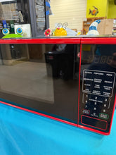 Mainstays 0.7 cu. ft. Countertop Microwave Oven, 700 Watts, Red! (USED - DENTED)