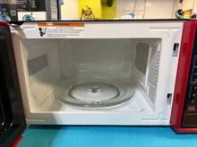 Mainstays 0.7 cu. ft. Countertop Microwave Oven, 700 Watts, Red! (USED - DENTED)