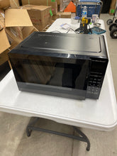 Hamilton Beach 0.9 Cu. ft. Matte Black Microwave Oven- new - open box or manual