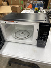 Hamilton Beach 0.9 Cu. ft. Matte Black Microwave Oven- new - open box or manual