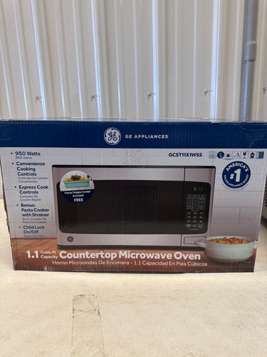 GE 21 Inch Wide 1.1 Cu. Ft. 950 Watt Countertop Microwave with Touch Controls! (NEW)