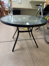 Winston Porter 40'' in. Round Metal Outdoor Dining Table with Umbrella Hole, Tempered Glass Top - WE DO NOT SHIP!!