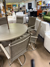 CLEARANCE SALE!  10- Piece Metal Outdoor Dining Set with 60 in. Sandshell Round Table, 8 Sandshell Swivel Dining Chairs for 8 Person and umbrella - new / assembled!