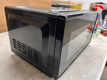 Mainstays 0.7 Cu ft Compact Countertop Microwave Oven, Black!! NEW OUT OF BOX(DENT FROM SHIPPING)!!
