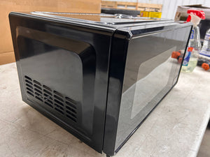 Mainstays 0.7 Cu ft Compact Countertop Microwave Oven, Black!! NEW OUT OF BOX(DENT FROM SHIPPING)!!