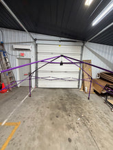12 by 12 LOGO canopy- has kink in one strut- please see pics- does set up ok