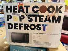 Chefman 0.7 cu. ft.Countertop Microwave in Black with Presets, Power Levels, Mute, 30 Seconds, Eco Mode, Child lock, 700 Watts! (NEW IN BOX)