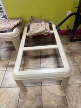 Modern coffee table with glass top - used