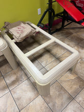 Modern coffee table with glass top - used