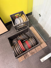 Weight bundle - over 150 lbs cast iron and some vinyl plates and two dumbbell bars