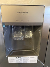 Frigidaire 25.6-cu ft Side-by-Side Refrigerator with Ice Maker, Water and Ice Dispenser (Fingerprint Resistant Stainless Steel) ENERGY STAR! (BRAND NEW - MINOR DENT ON DOOR!)