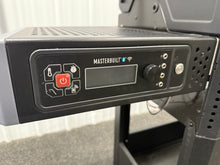 Masterbuilt AutoIgnite Series 545 Digital Charcoal Grill and Smoker in Black!! BRAND NEW(HANDLE BROKE OFF DURING SHIPPING)!!