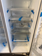 Frigidaire Gallery 26-cu ft Side-by-Side Refrigerator with Ice Maker and Water Dispenser ( Smudge-Proof Stainless Steel ) ENERGY STAR Certified! (NEW - MINOR DENT)