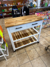 This Seville Classics Kitchen Cart features a beautiful natural acacia wood top with matching wood shelving and a sturdy white frame- no shipping
