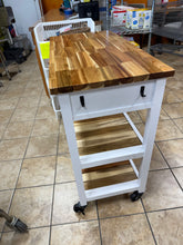 This Seville Classics Kitchen Cart features a beautiful natural acacia wood top with matching wood shelving and a sturdy white frame- no shipping
