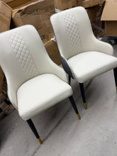 Check out this beautiful pair of brand new modern dining chairs — stylish, comfortable, and priced to MOVE!  No shipping