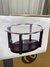 Benton 35 in. Espresso/Clear Round Glass Top Coffee Table with Casters! (NEW IN BOX)