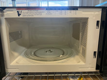 Kenmore 0.7 cu-ft Microwave - Black! (USED LIGHTLY - VERY CLEAN - MINOR DENT!