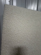 We have this beautiful white bouclé fabric padded KING headboard at an awesome Big Catch price!
