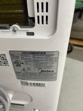 Midea 50 Pint EasyDry Dehumidifier with Built-In Pump- used - missing pump drain hose and intake air filter