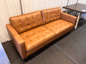 Harstine Leather Sofa! (NEW - CUSHION HAS PULLED THREAD)