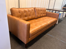 Harstine Leather Sofa! (NEW - CUSHION HAS PULLED THREAD)