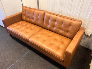 Harstine Leather Sofa! (NEW - CUSHION HAS PULLED THREAD)