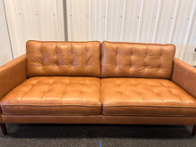 Harstine Leather Sofa! (NEW - CUSHION HAS PULLED THREAD)