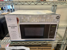 Mainstays 0.7 Cu ft Compact Countertop Microwave Oven, White!! NEW IN BOX!!